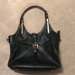 Black faux leather purse. Great condition!